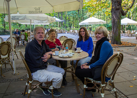 the travelers enjoying a snack at the park