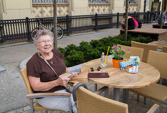 Mom enjoying a cold drink in the Town Square