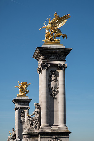 2 of the golden statues on the Alexader III Bridge