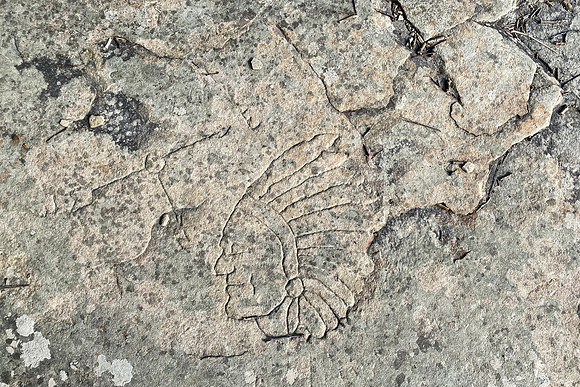 carved in the flat rock seen in image #8